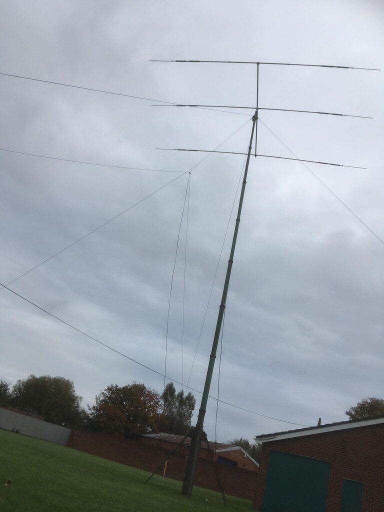 A variety of wire antenna and a HyGain TH3 HF beam atop a Clark Scam 12m pneumatic mast for JOTA 2019